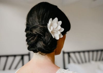 wedding updo with flower for Hamptons wedding at East Hampton Pointe in Long Island NY