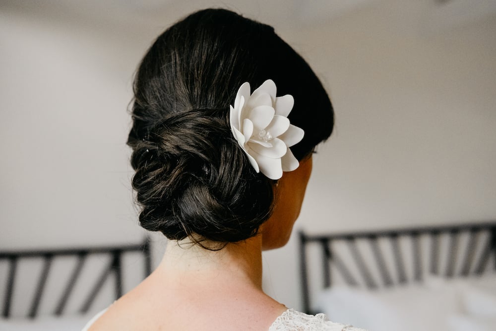 wedding updo with flower for Hamptons wedding at East Hampton Pointe in Long Island NY