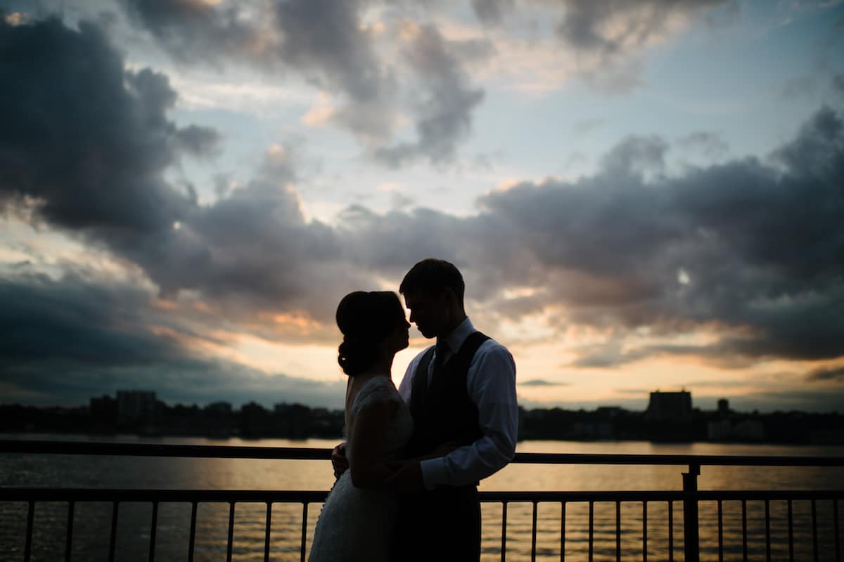 Updo hairstyle for bride at Sunset terrace at Chelsea Piers in NYC